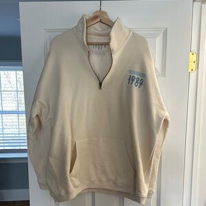 Cream Zip Up Sweater with High Collar and Relaxed Fit